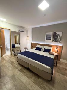 Leblon Design Hotel客房内的一张或多张床位