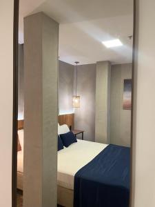 Leblon Design Hotel客房内的一张或多张床位