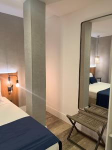 Leblon Design Hotel客房内的一张或多张床位