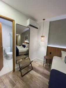 Leblon Design Hotel客房内的一张或多张床位