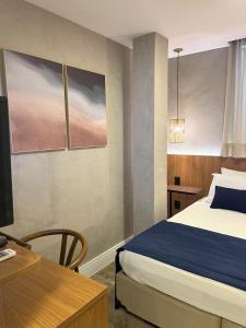 Leblon Design Hotel客房内的一张或多张床位