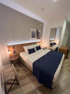 Leblon Design Hotel客房内的一张或多张床位