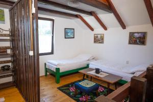 En eller flere senge i et værelse på Koliba Ravna planina