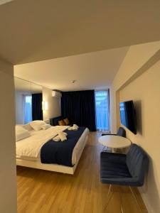 Cama ou camas em um quarto em Orbi City