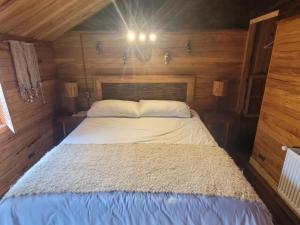 Postel nebo postele na pokoji v ubytování ALMA CHILOTA