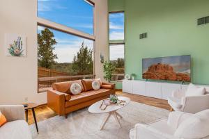 a living room with a couch and a table at Sedona Family Vacation in Sedona