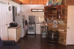 Kjøkken eller kjøkkenkrok på Cabaña Privada.