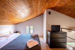 Postel nebo postele na pokoji v ubytování La Caletta di Afrodite