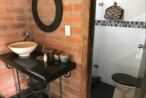 Koupelna v ubytování Rancheria Loft Chalet, lago privado + 22 fotografií