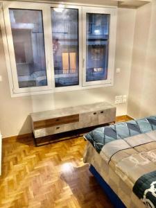 Ένα ή περισσότερα κρεβάτια σε δωμάτιο στο Economy shared apartment D in central Athens