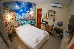 Katil atau katil-katil dalam bilik di Shelter Hostel e Pousada