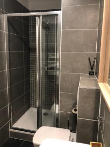 Et badeværelse på Elisabeth Downtown Suites + 13 billeder