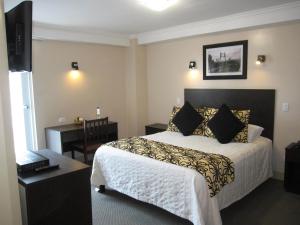Postel nebo postele na pokoji v ubytování Hotel Novalux + 37 fotografií