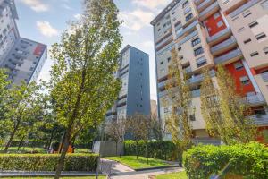 a group of buildings in a city at Sarca 11th Floor in Milan