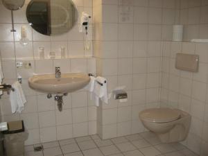 Koupelna v ubytování Hotel Kramer