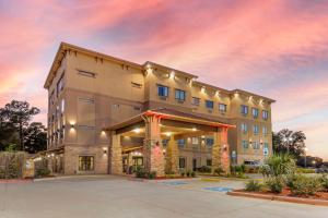 a rendering of the front of a hotel at Best Western Plus Classic Inn and Suites in Center
