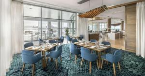 Un restaurante o sitio para comer en Hilton Auckland