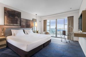 Cama o camas de una habitación en Hilton Auckland