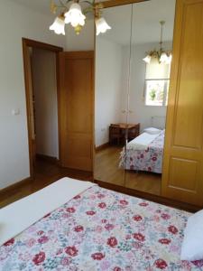 Postel nebo postele na pokoji v ubytování Vivienda adosada , con merendero en Carcedo