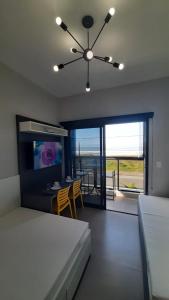 Katil atau katil-katil dalam bilik di Studio 107 Maravilhoso Frente Mar Piscina Aquecida +48 gambar