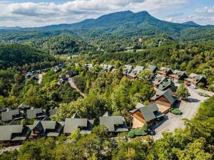 an aerial view of a village in the mountains at Cabin-n-Smokys! Indoor Resort Pool Views Hot Tub Game Room in Sevierville
