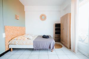Postel nebo postele na pokoji v ubytování Agréable studio vue Mer