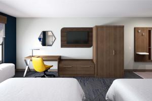 Postel nebo postele na pokoji v ubytování Holiday Inn Express & Suites Lima by IHG