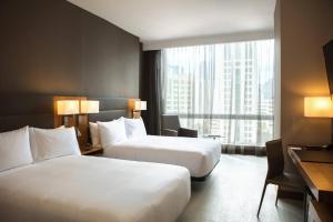 Cama ou camas em um quarto em AC Hotel by Marriott Panama City