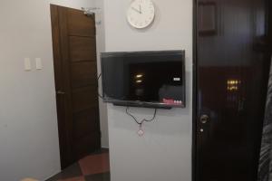 TV a/nebo společenská místnost v ubytování Cerca Hotel