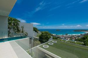 a view of the ocean from the balcony of a house at The heights Penthouse Ocean view A11 in Kata Beach