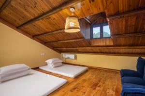 Postel nebo postele na pokoji v ubytování Yangshuo Coco Garden Hotel
