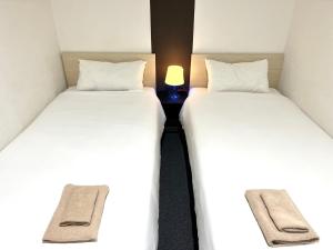 Lova arba lovos apgyvendinimo įstaigoje Hotel Links Dobutsuenmae
