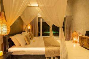 Khu vực ghế ngồi tại Canggu garden family villa, short walk to the Beach