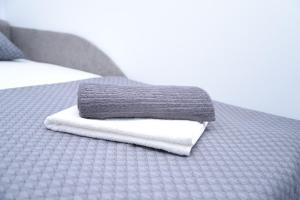 Postelja oz. postelje v sobi nastanitve ITACA apartman Krupanj