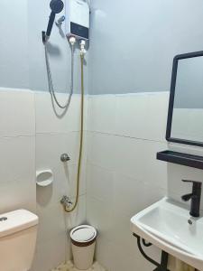 Koupelna v ubytování Cozy Coron Inn
