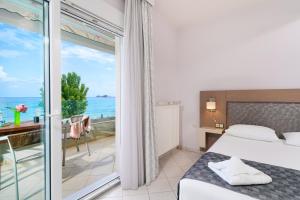 Postel nebo postele na pokoji v ubytování Endless Blue Sea Resort + 81 fotografií