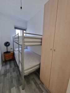 Postel nebo postele na pokoji v ubytování Apartamentos daurada calafell
