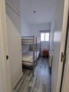 Postel nebo postele na pokoji v ubytování Apartamentos daurada calafell