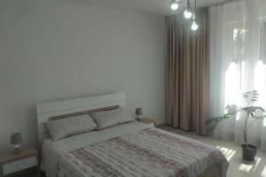 Ένα ή περισσότερα κρεβάτια σε δωμάτιο στο Elena´s Home