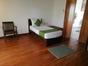 Letto o letti in una camera di KayJay Palms