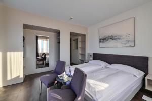 Postelja oz. postelje v sobi nastanitve Hotel Luna Garni