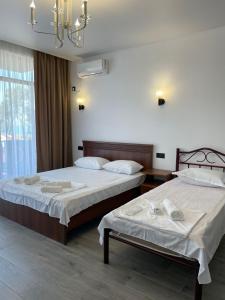 Ένα ή περισσότερα κρεβάτια σε δωμάτιο στο El Mari