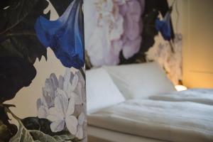 Voodi või voodid majutusasutuse FLÜHLI Hotel Kurhaus toas