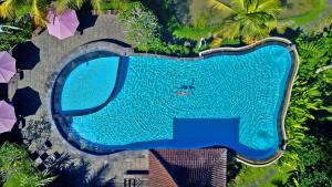 Bazén v ubytování Uma Dawa Resort and Spa nebo v jeho okolí