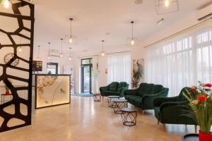 Posezení v ubytování NOVUS Hotel