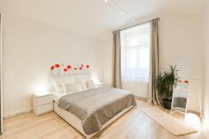 Postel nebo postele na pokoji v ubytování Kubelíkova 32 Residence