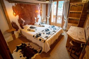 Postel nebo postele na pokoji v ubytování Savoya Lodges
