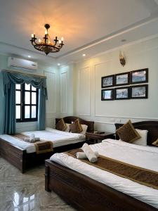 Un pat sau paturi într-o cameră la Ma Pi Leng Hotel