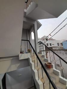 a staircase in a house with some plants at Double Bedroom in Homestay in Gorakhpur