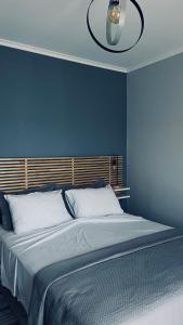 Кровать или кровати в номере Thalistris Room